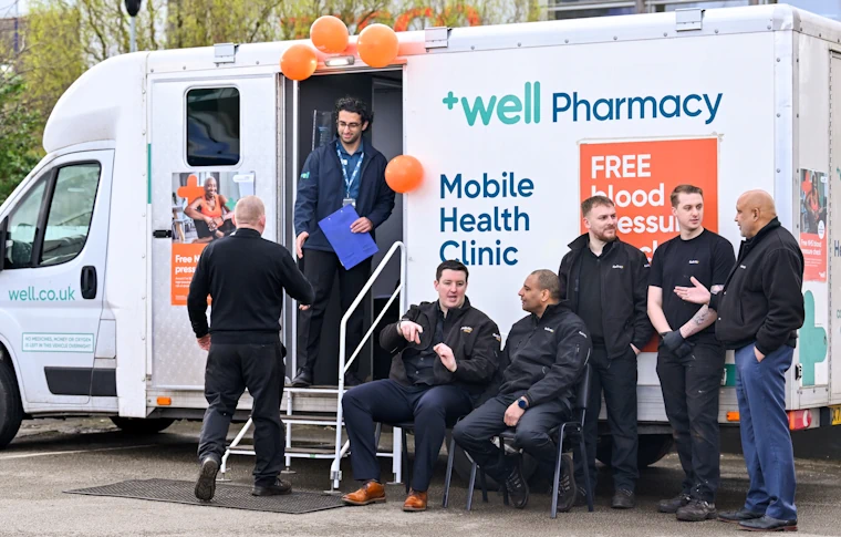 Kwik Fit staff receiving their free blood pressure check